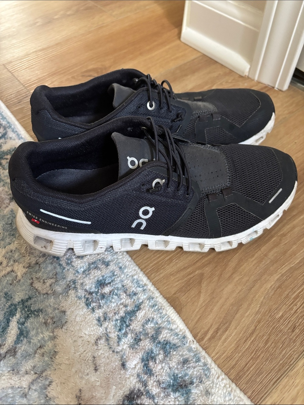 On Running Men’s Black and White Cloud Sneakers